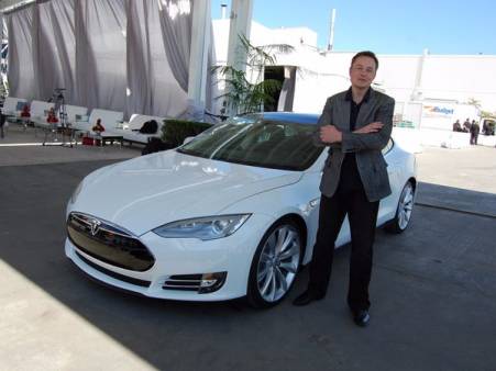 Elon musk along with his car